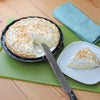 Delicious 8" Coconut Cream Pie being sliced and served up