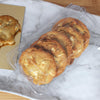 compostable container for 3 inch cookies or flat baked goods, with white chocolate cookies