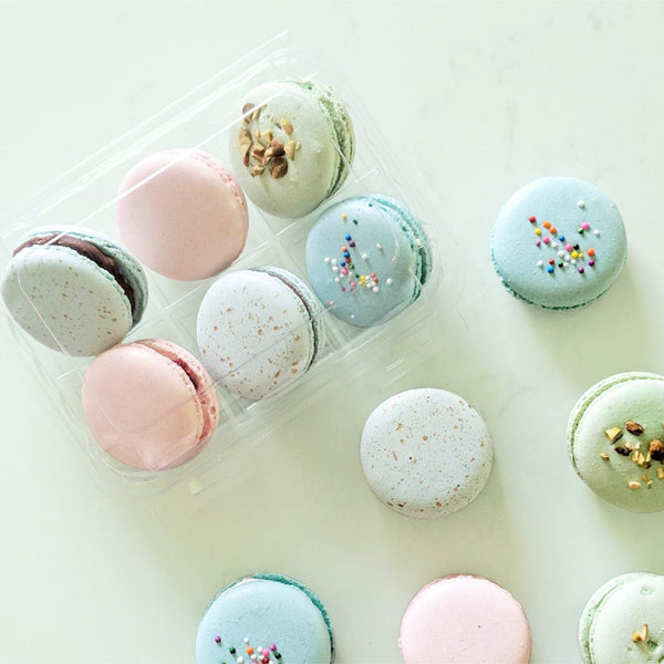 1.75"  treat package made of clear, compostable plastic containing assorted macarons