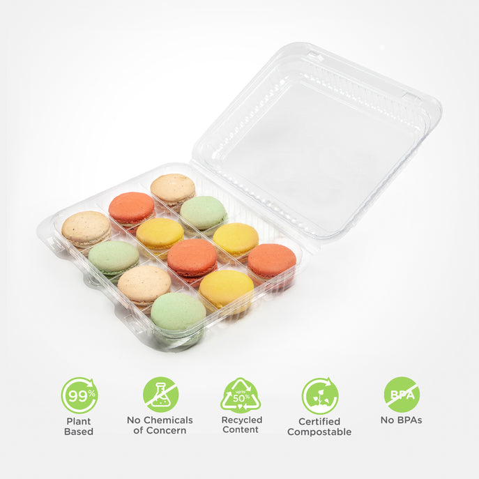 Open treat container with 12 colored macarons